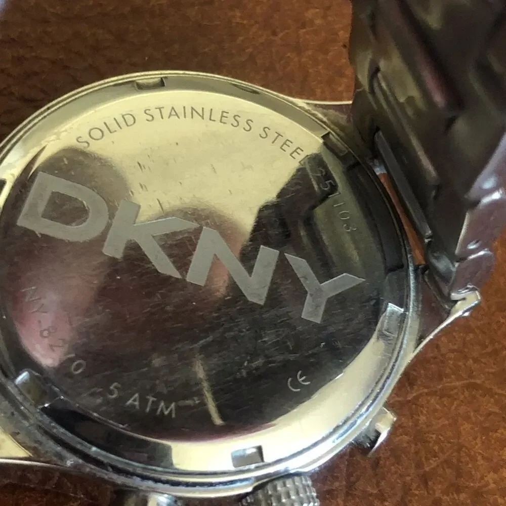 DKNY womens silver watch large dial rhinestone bezel